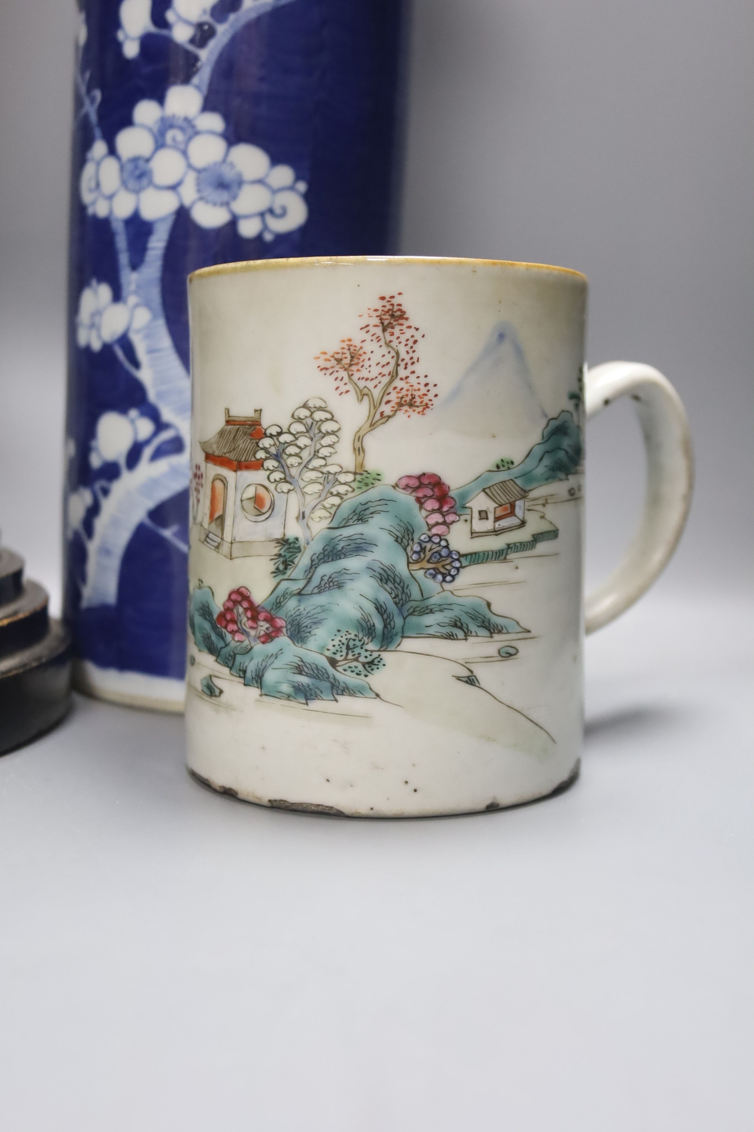 An 18th century Chinese famille rose mug, a Chinese Imari tea caddy and two Chinese blue and white sleeve vases 30cm (4)
